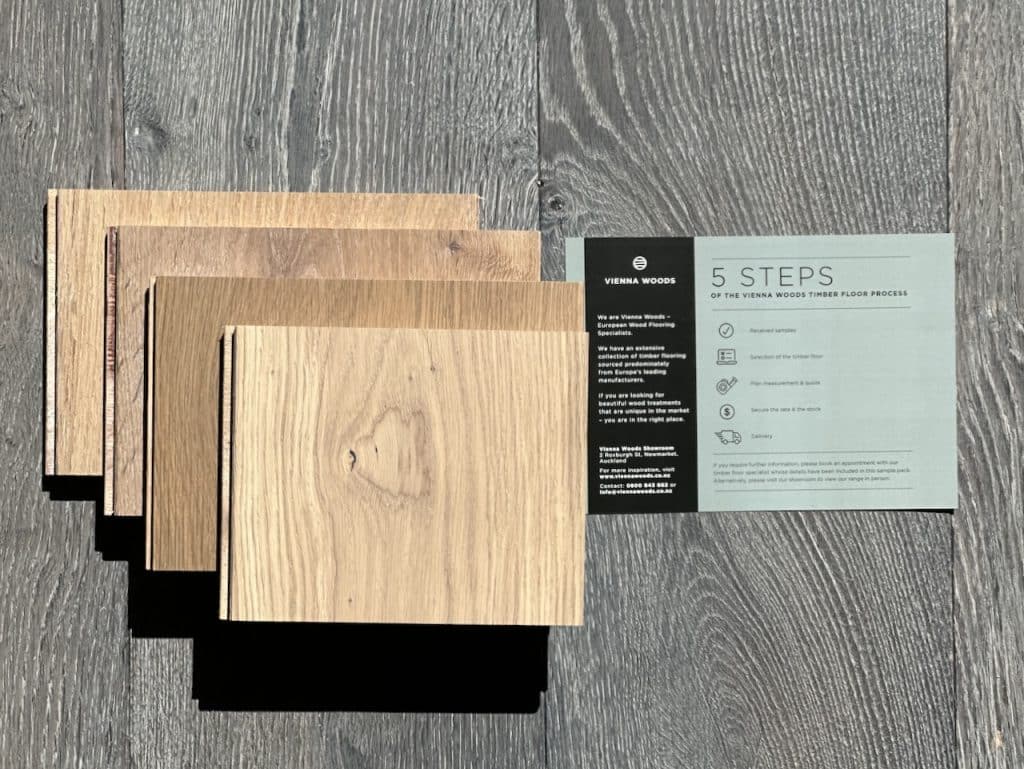Vienna Woods European oak flooring samples laid out with the sample pack card