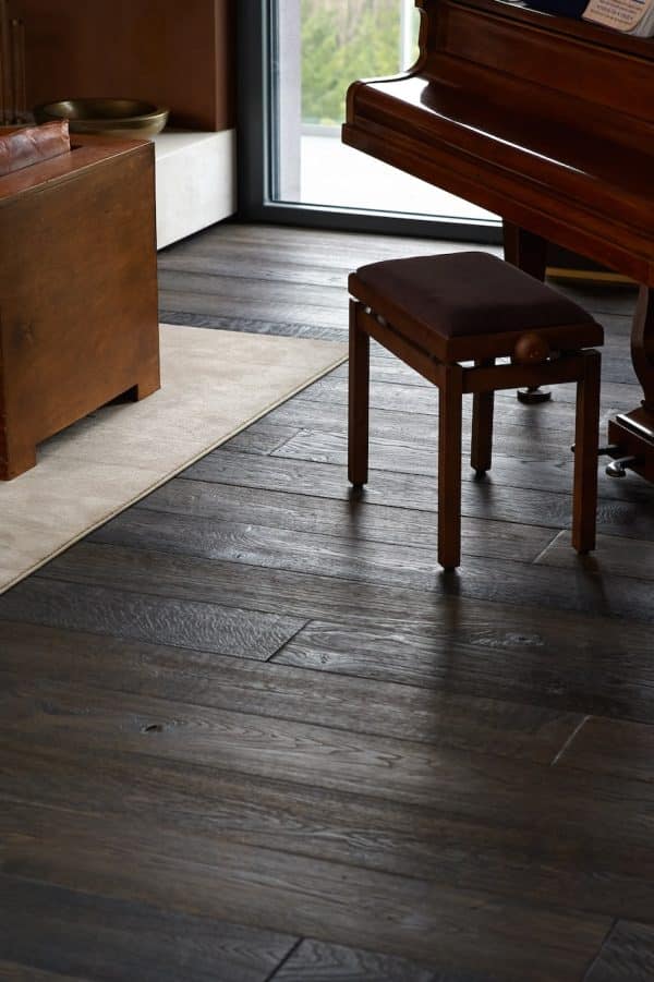 Renaissance N7 oak flooring, featuring XVIII century style heavy brushing and artisanal reactive stain finish, suitable for elegant interior designs.