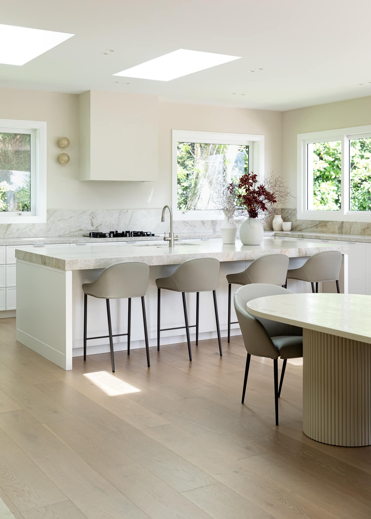 Kitchen island above warm mid-tone oak floorboards