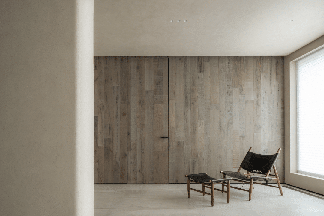 European Reclaimed Timber Flooring and Wall Panelling - stark room with chair.  Architectural.