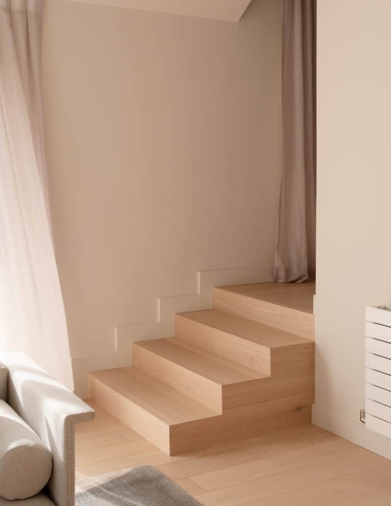 Greenbelt House Stairs, showcasing Vienna Woods Sazerac Prime Grade Wood Flooring