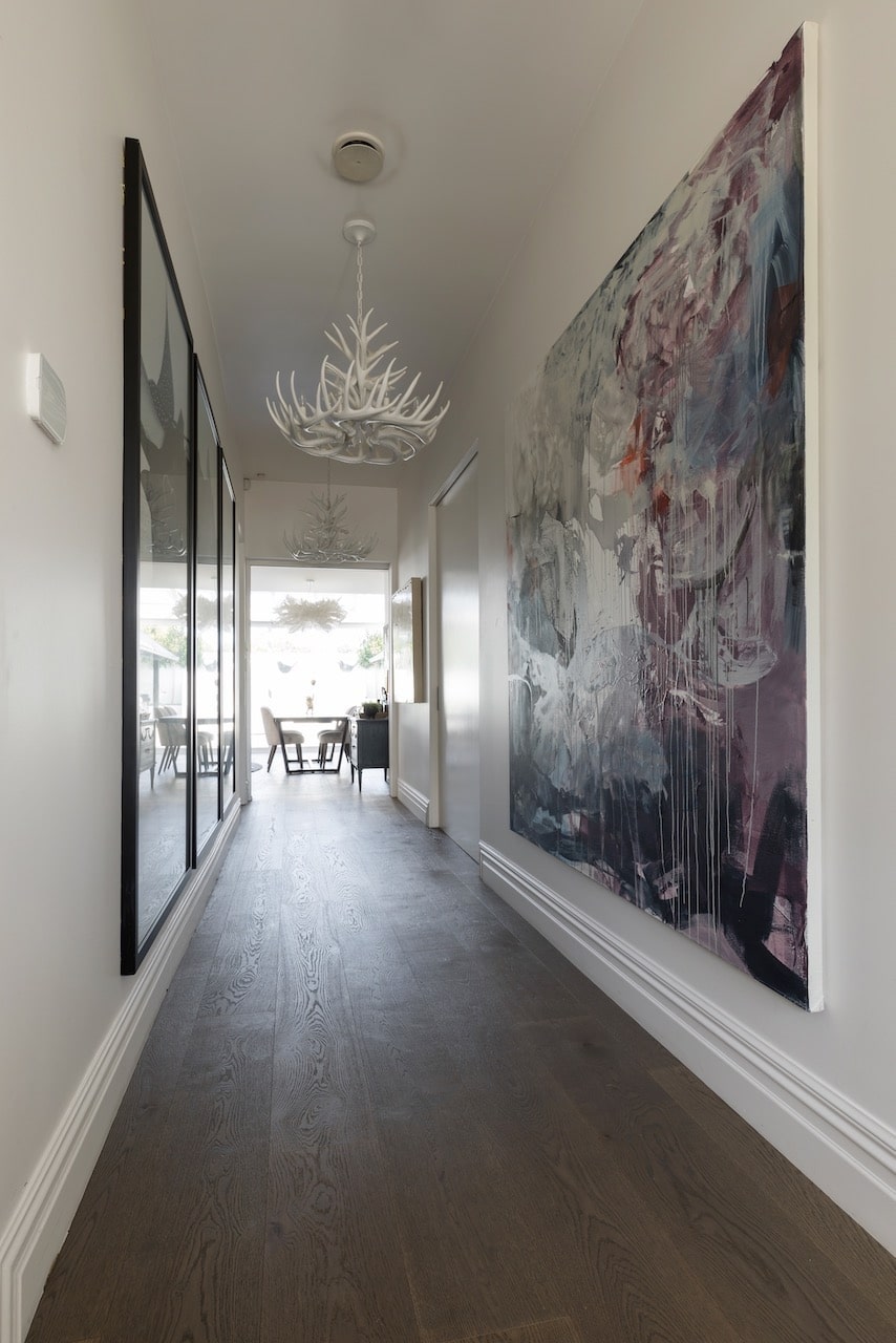 grey brown wood flooring in hallway