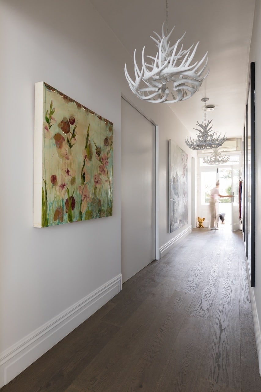grey brown wood flooring in hallway