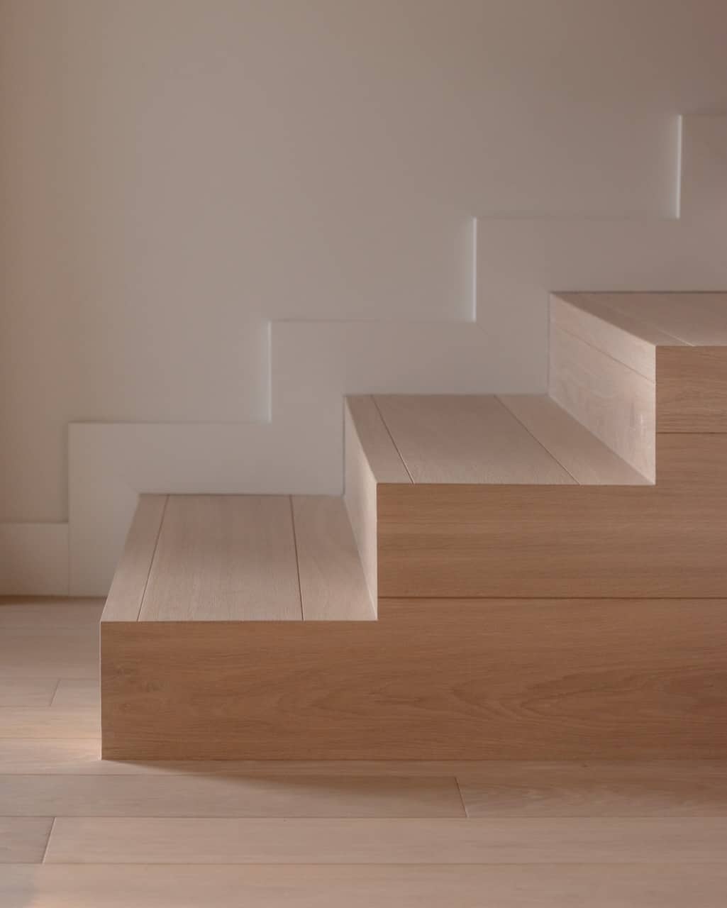Engineered European oak timber stairs with closed risers and stepped side profile