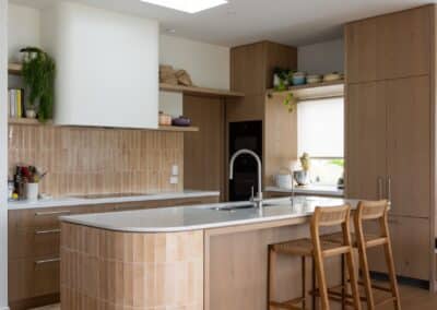 Bordeaux European oak timber flooring in Auckland kitchen with island and joinery