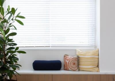 Built-in window seat with Bordeaux European oak timber flooring in Auckland home