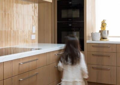 Bordeaux European oak timber flooring in Auckland kitchen with child