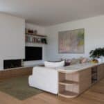 TV nook with built-in shelving and Bordeaux European oak timber flooring in Auckland home