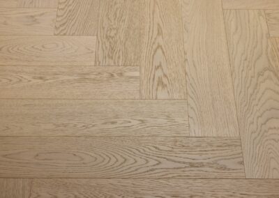 Bordeaux engineered oak herringbone flooring grain detail in Westmere home