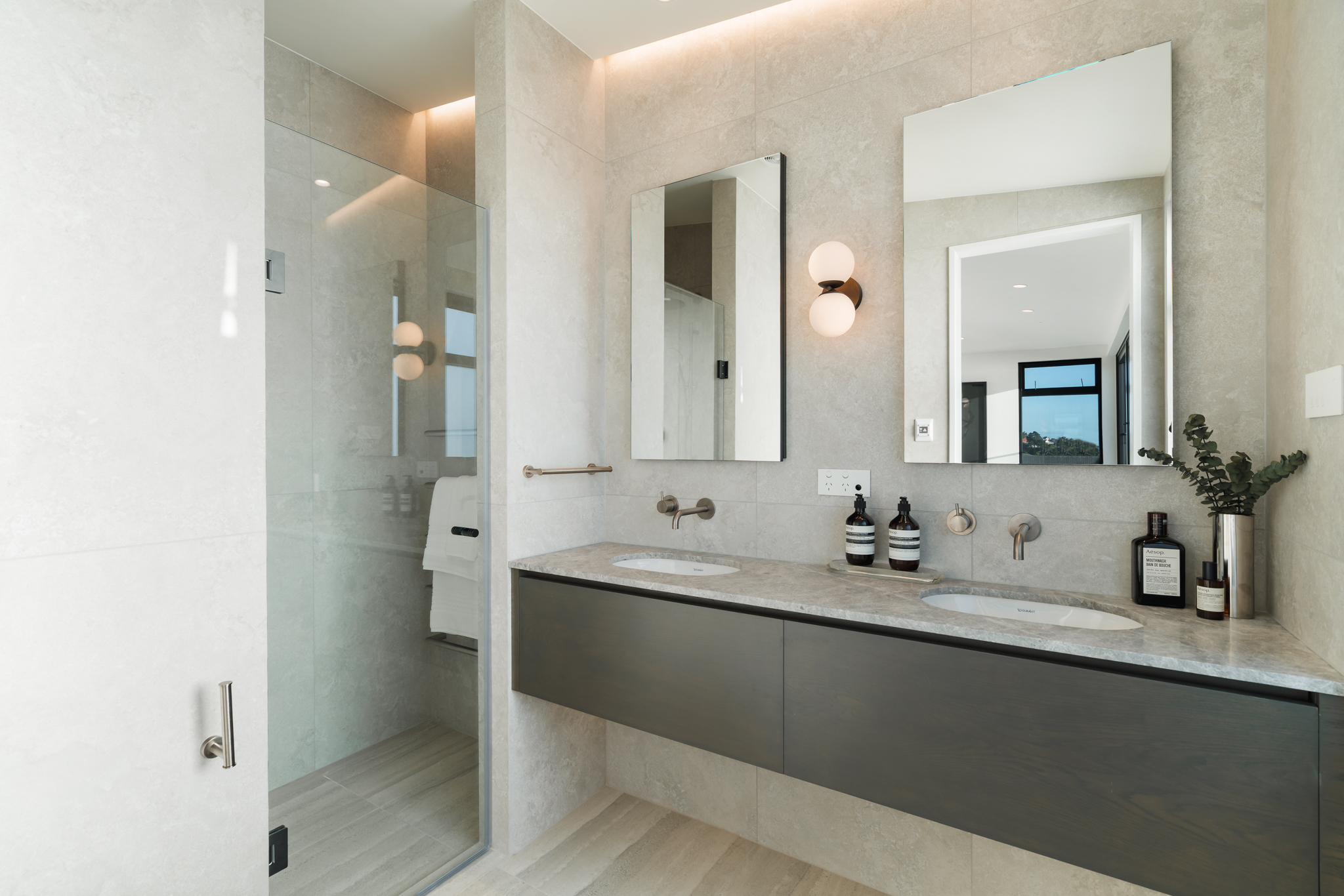 Westwood engineered oak flooring in bathroom with twin vanity, Westmere Auckland.
