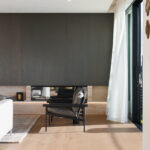 Westwood engineered oak flooring in a living room with full-height curtains, Westmere Auckland.