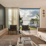 Westwood engineered oak flooring in living room opening to Auckland harbour view, Westmere.