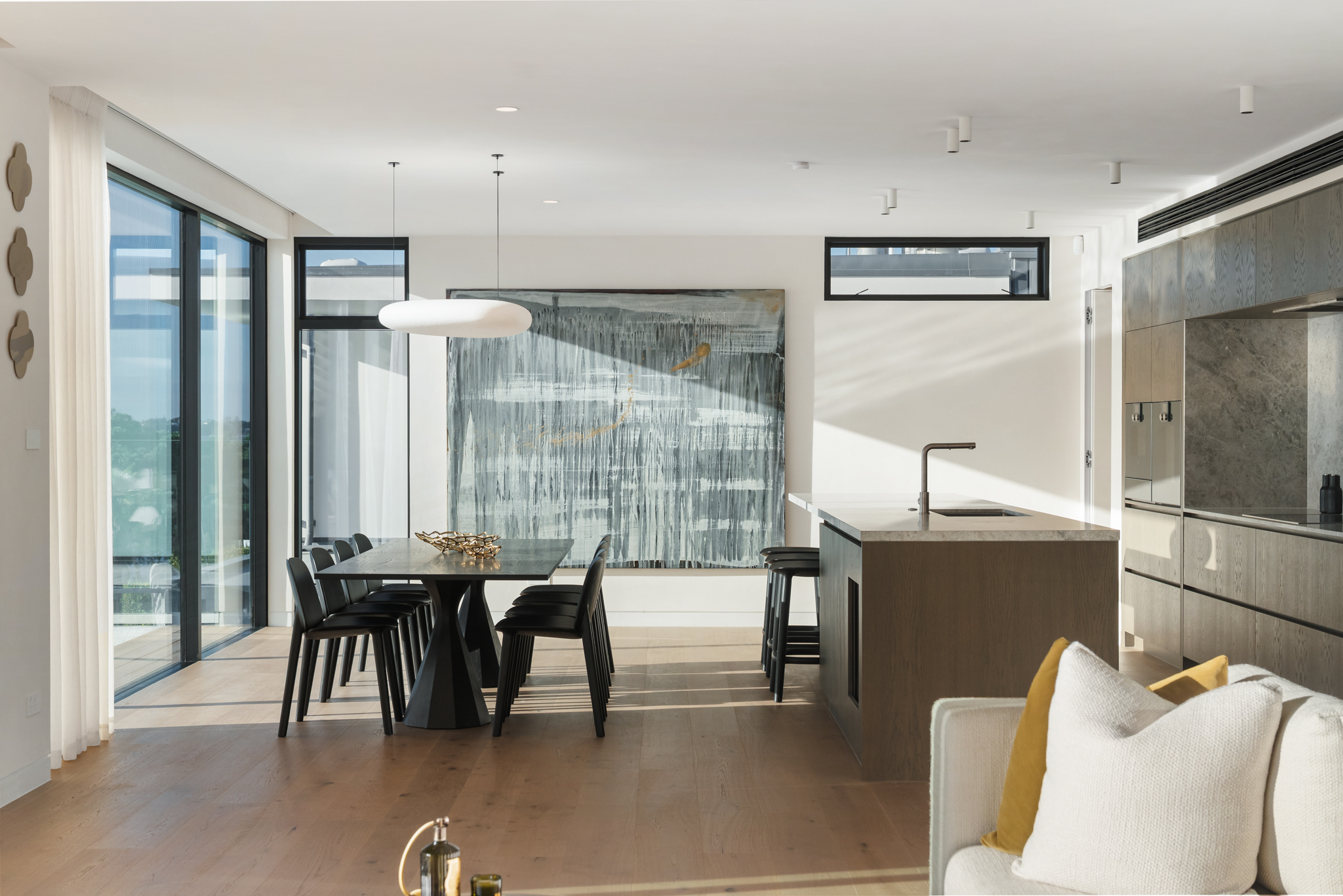Westwood engineered European oak flooring in an open-plan kitchen and dining area, Westmere Auckland.