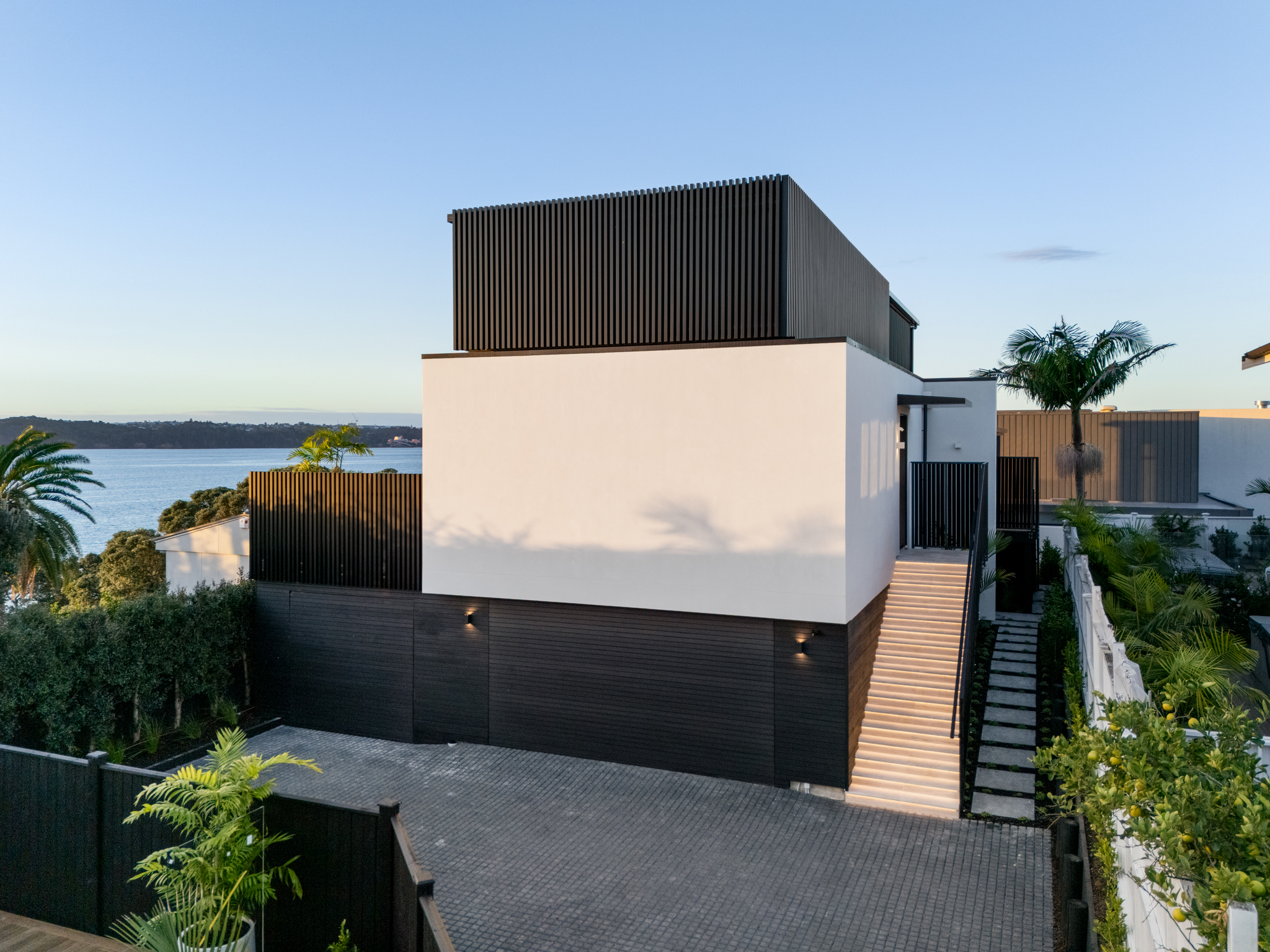 Dusk exterior of modern Westmere Auckland home by MacFie Architecture.